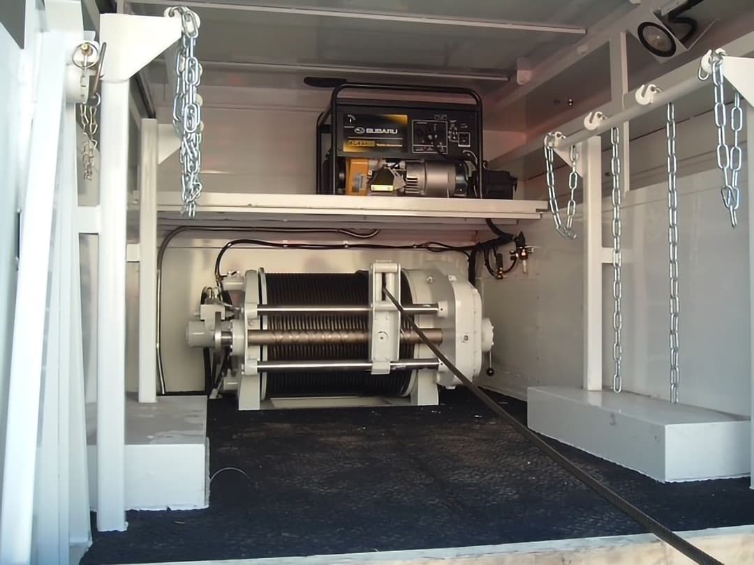 cable pulling device in back of truck